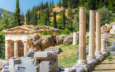 Ancient city of Delphi with ruins of the temple of Apollo, the omfalos (center) of the earth, theater, arena and other buildings, Greece