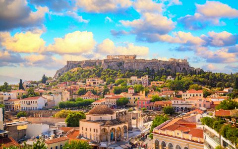 Skyline of Athens with Monastiraki square and Acropolis hill during sunset. Athens, Greece